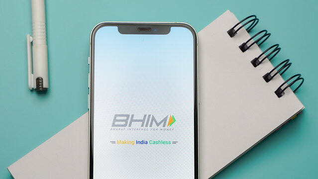BHIM UPI mobile phone app on colour background: Kolkata, West Bengal, India - December 15 2022