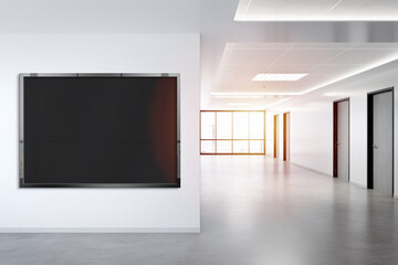Black horizonal frame Mockup hanging on wall. Mock up of a billboard in modern concrete office interior 3D rendering