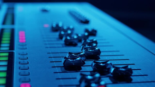 Close-up of the movement of the sticks of the sound console