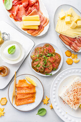 Appetizers with differents antipasti, charcuterie, snacks, meat platter with cheese and spicy olives