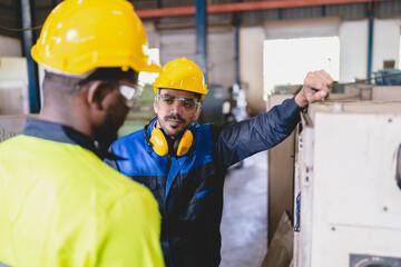 professional business industry technician wearing safety helmet working to maintenance service and checking factory equipment, a work of engineer occupation in manufacturing construction technology