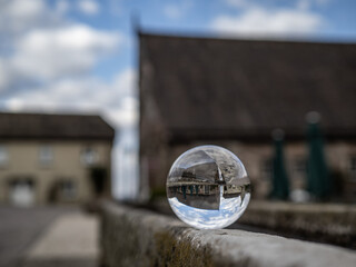 Crystal lens refractory ball in city