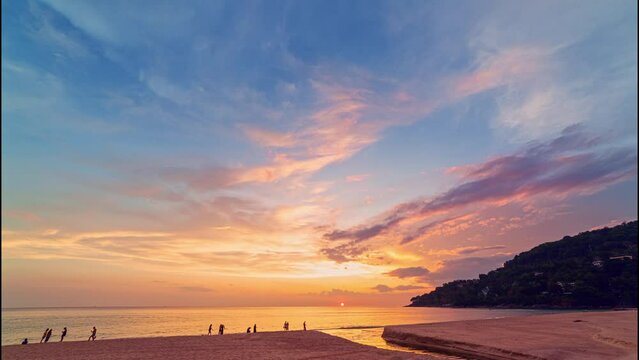 time lapse amazing yellow sky above the sea in sunset at Karon beach Phuket..Imagine a fantasy bright golden sky at sunset..reflection Gradient gold color. Sky texture background. .