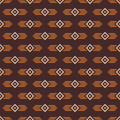 Abstract ethnic seamless geometric pattern. Tribal and ethnic motif with rhombuses, lines. Brown, orange color. Color vector background. Design for background, clothing, wrapping, batik, fabric.