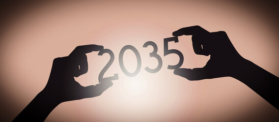 2035 - human hands holding black silhouette year number