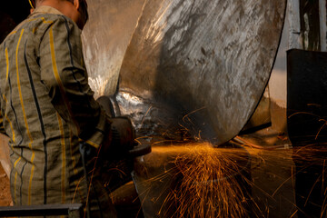 Dhaka Shipyard, Keraniganj, Bangladesh. The shipyards along the outskirts of the Bangladesh capital are a flurry dangerous boat breaking and rebuilding. 