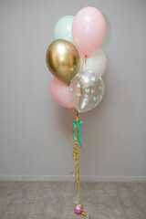 pink balloons on a wooden background