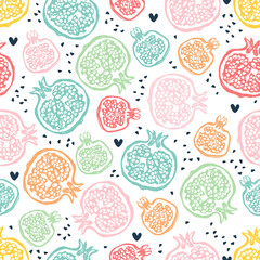 Seamless pattern for different types of printing. Cute design element. Colored pomegranate fruits in cut form. Creative scribble style.