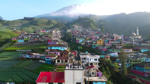 Aerial view of Nepal Van Java tourist village on the slope of Sumbing Mountain. A colorful village in Indonesia, which is similar to the Namche Bazaar in Nepal