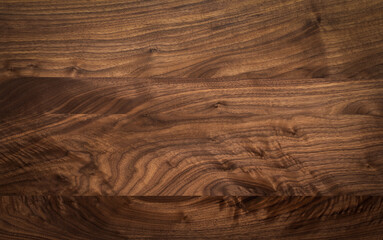 Dark tone walnut wood table top texture background. Solid wood top. Empty desktop. wood texture...