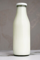 Milk in Plain Glass Bottle 