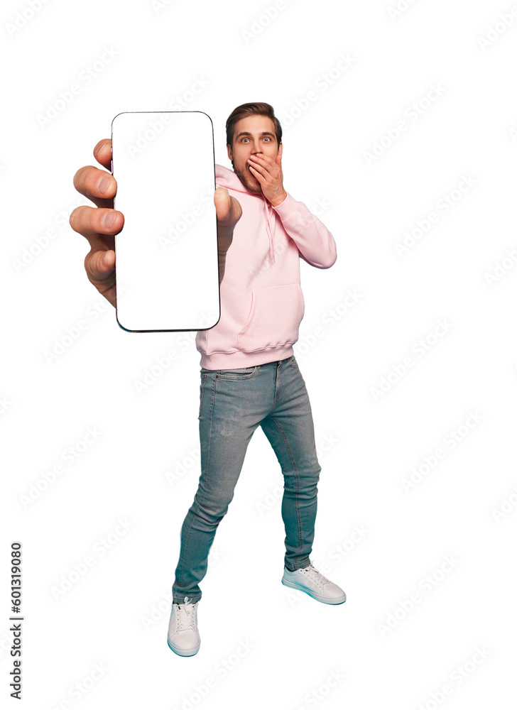 Wall mural mobile app advertisement. handsome excited man showing pointing at empty smartphone screen posing ov
