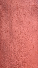red plaster wall texture with crack