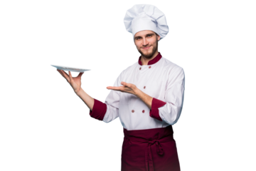 Portrait of a happy male chef cook standing with plate isolated on transparent background