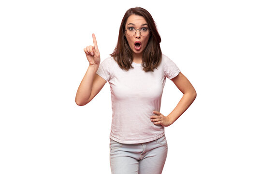 Image of surprised young woman standing isolated over transparent background