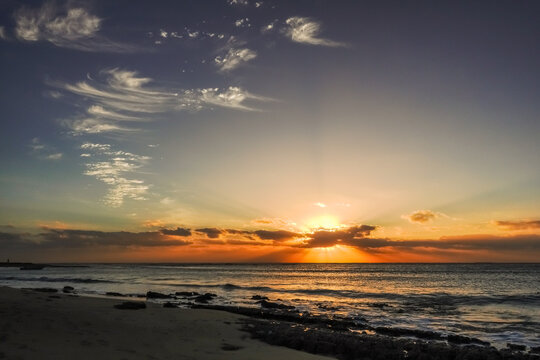 amazing shining warm sunrise with soft cirrus clouds at the blue ksy
