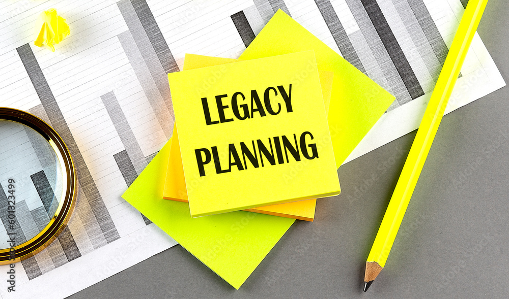 Poster legacy planning text on sticky on sticky on chart with pen