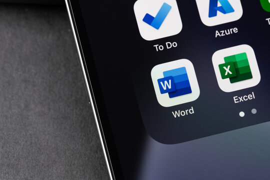 Microsoft Word, Excel mobile apps on the screen smartphone. Microsoft Corporation is an American multinational technology company. Batumi, Georgia - April 24, 2023
