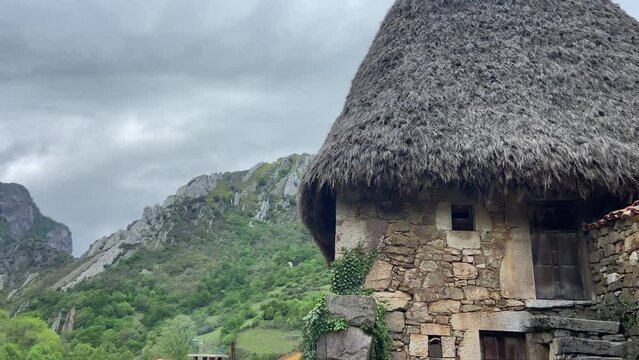 Old thatched cabin in a rural village in the valley of Somiedo. Asturias, Spain