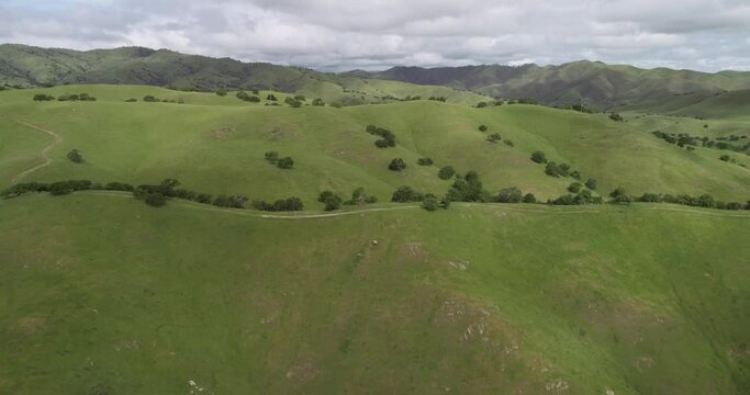 Upper Cottonwood Creek Wildlife Area with San Luis Reservoir in Background near Los Banos. California. USA. Mountains in Background. Drone