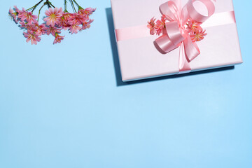 Background of pink decorated box and flowers