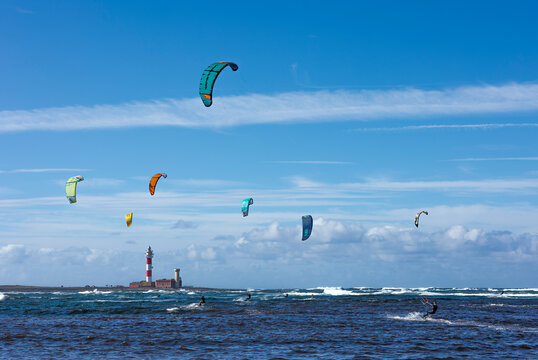 Kite surfing at El Cotillo Fuerteventura with El Toston Lighthouse in the background