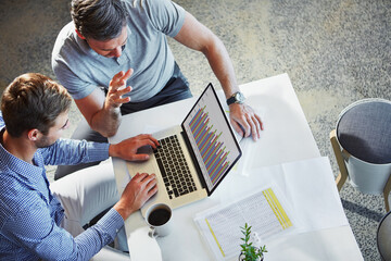 Laptop statistics, communication and business people teamwork on data analysis, accounting or research. Bar graph, cooperation and top view of collaboration team working on chart analytics review
