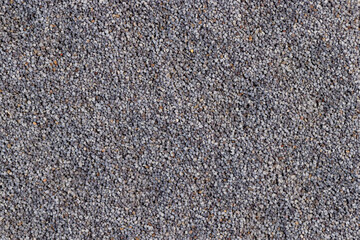 a close-up of a pile of poppy seeds used in cooking