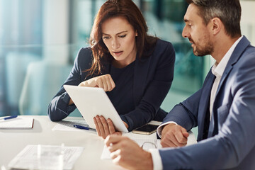 Collaboration, tablet and research with business people in the office for research on a company project. Teamwork, technology and brainstorming with a corporate team talking while planning at work