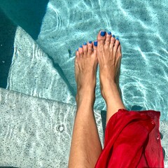 Feet in a pool