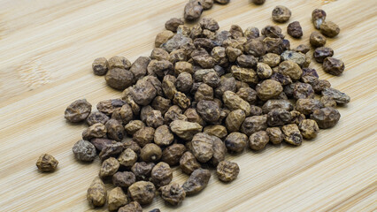 Tiger Nuts Displayed On Wood Surface