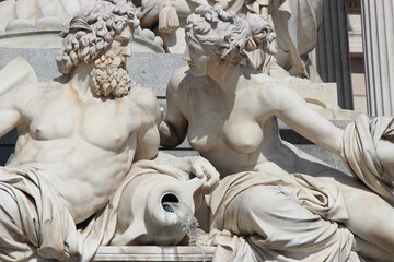 baroque fountain in front the parliament in vienna (austria)