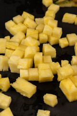 sliced ripe yellow pineapple, a large number of pieces