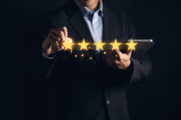 Man pointing at five stars icons, representing positive customer satisfaction concept. Excellent...