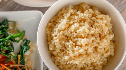 Wholesome Goodness: Captivating Close-up of Cooked Brown Rice in a plate 