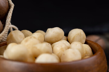 Peeled macadamia nuts on the table