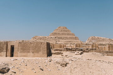 Fototapeta na wymiar step pyramid at Saqqara is the oldest surviving large stone building in the world. Built by the architect Imhotep in Saqqara for the burial of Pharaoh Djoser circa 2650 BC.