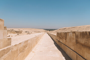 Ancient Egyptian ruins. Way to valley temple of the pyramids