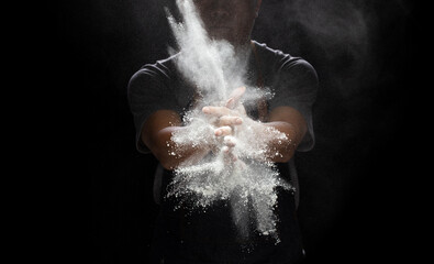 Chef prepare white flour dust for cooking bakery food. Elderly man Chef clap hand, white flour dust...