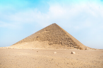 Fototapeta na wymiar Egypt. Dahshur or Dashur. Red Pyramid of Pharaoh Sneferu and fragment of the Bent Pyramid with retained of its original limestone casing