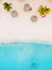 Fototapeta na wymiar Cas Abao Beach Playa Cas Abao Caribbean island of Curacao, Playa Cas Abao in Curacao Caribbean tropical white beach with a blue turqouse colored ocean. Drone aerial view at the beach