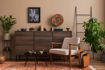 Stylish composition of living room interior with mock up poster frame, boucle armchair, round coffee table, wooden sideboard, plant, ;adder and personal accessories. Home decor. Template.