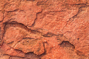 Red and yellow stone texture background. Material construction and architectural detail