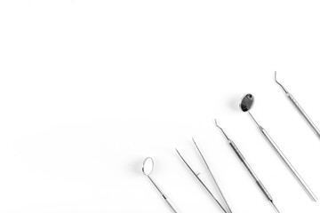 Pile of metal medical dental equipment tools for teeth care