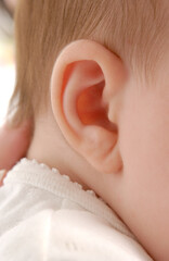 Close up of a cute lovely baby ear 