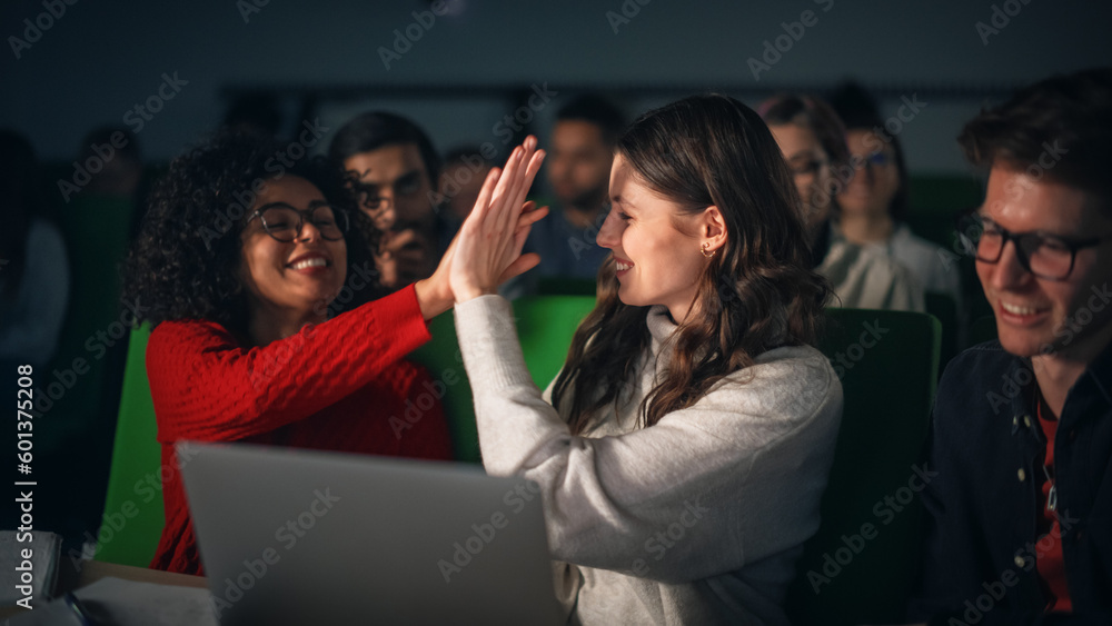 Aufkleber diverse happy students having a conversation in university classroom, working on a shared research p