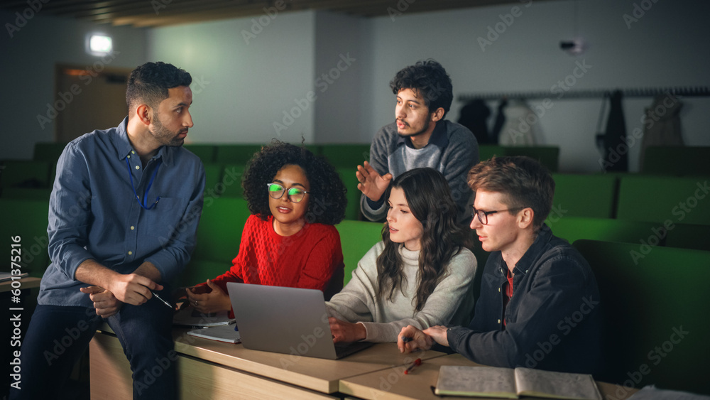 Poster group of diverse happy students having a conversation in university classroom, working on a shared r