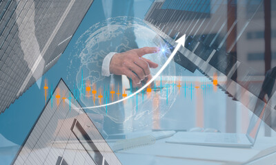 Investing, trading real estate market concept, financial chart candlestick and graphs on modern skyscraper tops bottom view background, investment financial concept, multi exposure