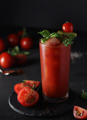 A glass with cold bloody mary cocktail