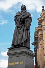 Statue of the Reformer Martin Luther before blue sky in Dresden, Germany